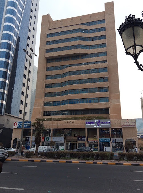Clinic building exterior at dusk