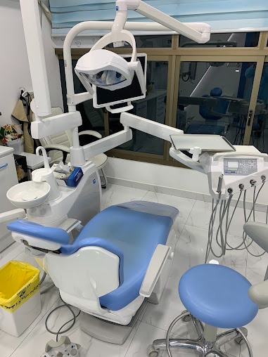 Treatment room with blue dental chair